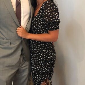 Black floral short sleeve dress size small rouched side